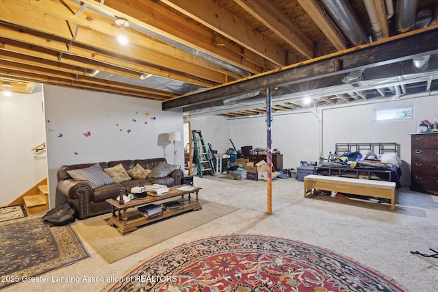 12898 Walker Rd, Leslie, MI 49251 - basement featuring stairway and carpet