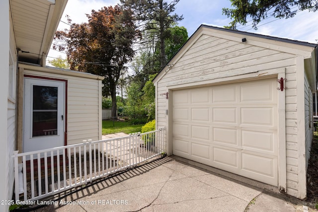 635 Division St, East Lansing, MI 48823 - detached garage with concrete driveway