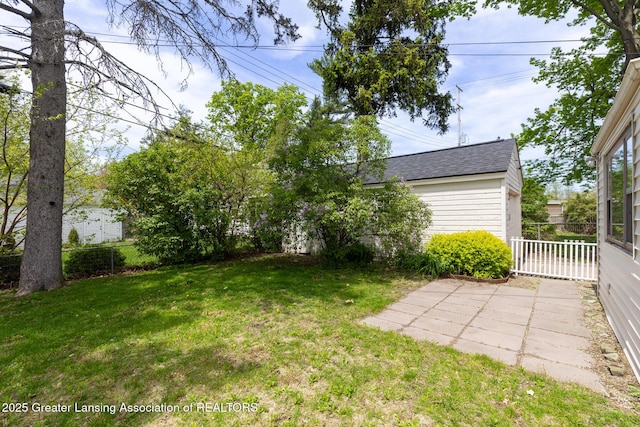 635 Division St, East Lansing, MI 48823 - view of yard with a patio