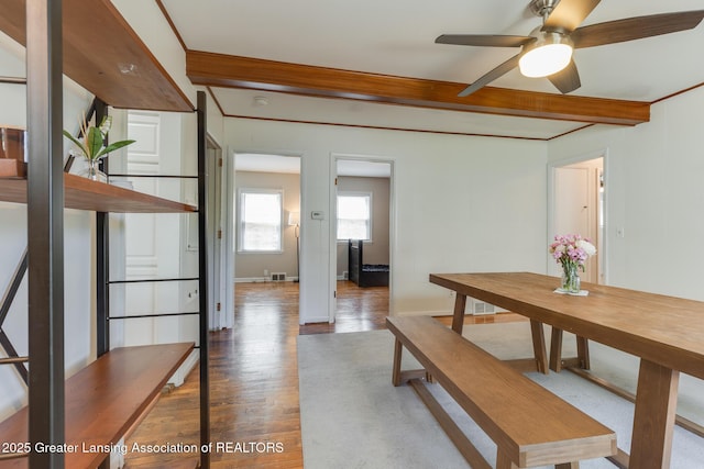 635 Division St, East Lansing, MI 48823 - dining area featuring wood finished floors, ceiling fan, beam ceiling, baseboards, and ornamental molding