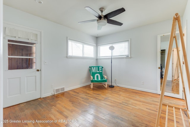 635 Division St, East Lansing, MI 48823 - unfurnished room with ceiling fan, light wood-type flooring, and baseboards