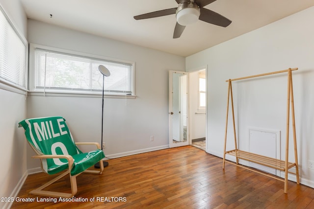 635 Division St, East Lansing, MI 48823 - unfurnished room featuring healthy amount of natural light, hardwood / wood-style flooring, and baseboards