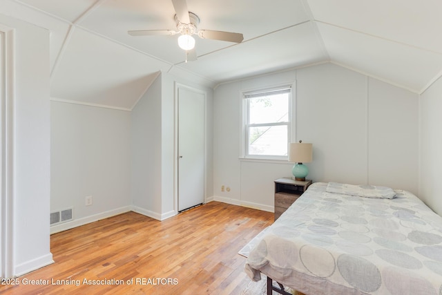 635 Division St, East Lansing, MI 48823 - bedroom featuring lofted ceiling, light wood finished floors, crown molding, baseboards, and ceiling fan