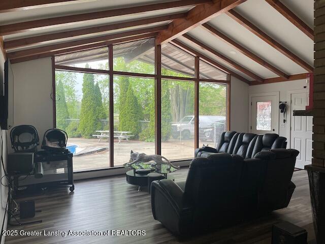 6157 W Stoll Rd, Lansing, MI 48906 - living area featuring wood finished floors