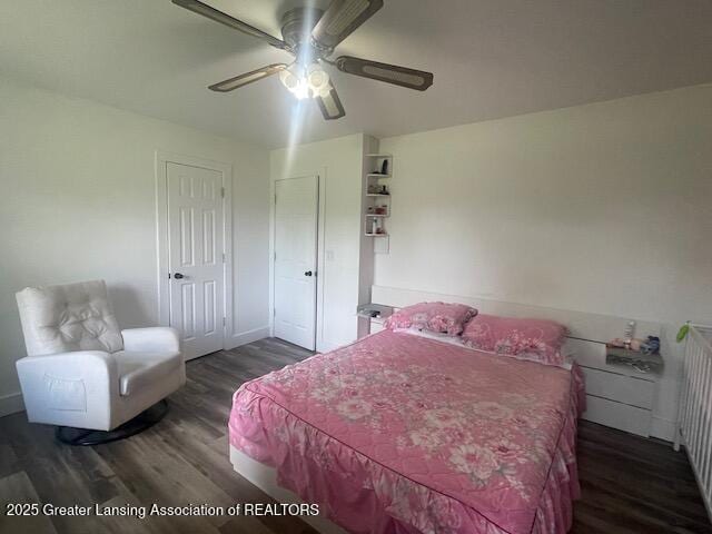 6157 W Stoll Rd, Lansing, MI 48906 - bedroom with wood finished floors and ceiling fan