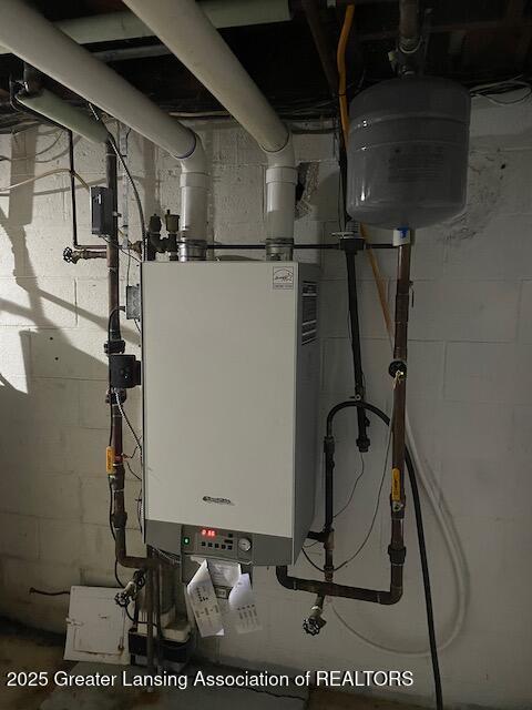 6157 W Stoll Rd, Lansing, MI 48906 - utilities featuring tankless water heater