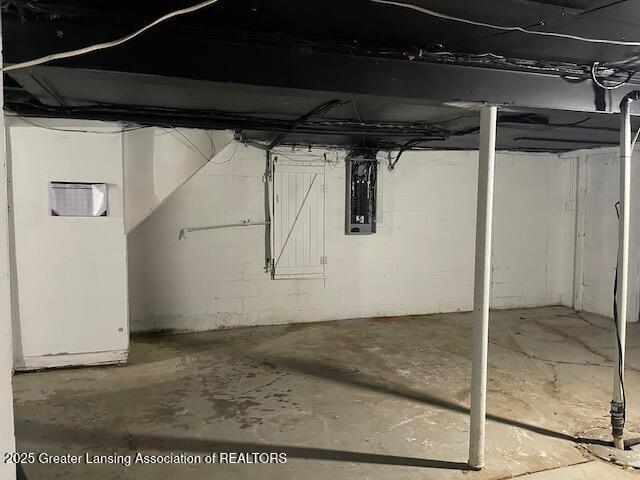 6157 W Stoll Rd, Lansing, MI 48906 - unfinished below grade area featuring electric panel