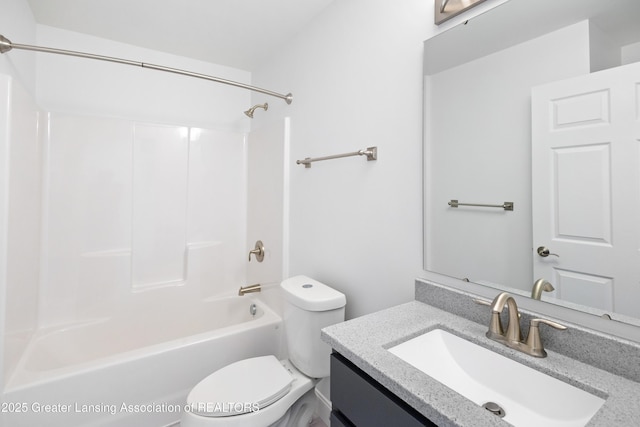 2107 Reo Rd, Lansing, MI 48910 - full bathroom featuring toilet, vanity, and shower / washtub combination