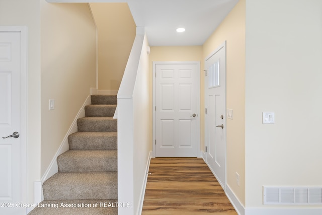 4205 Glenburne Blvd, Lansing, MI 48911 - stairs with recessed lighting, baseboards, and wood finished floors