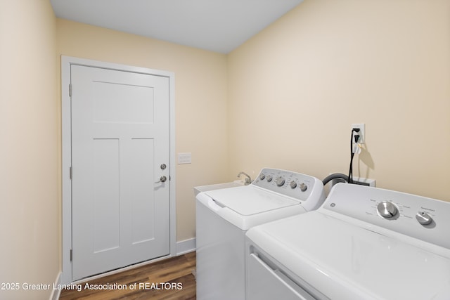 4205 Glenburne Blvd, Lansing, MI 48911 - laundry area with washer and clothes dryer, dark wood finished floors, and baseboards