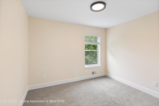4205 Glenburne Blvd, Lansing, MI 48911 - empty room featuring baseboards and carpet floors