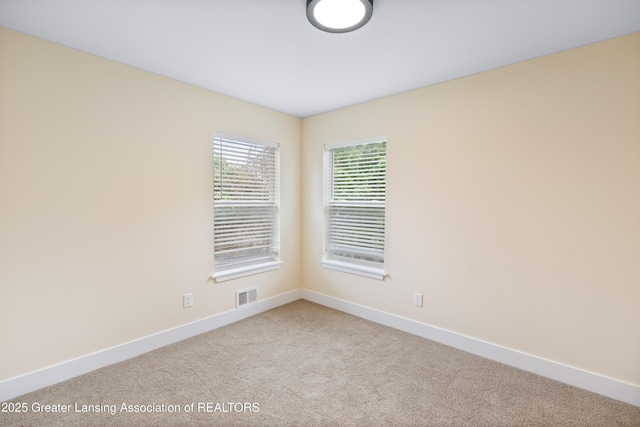 4205 Glenburne Blvd, Lansing, MI 48911 - carpeted empty room featuring baseboards
