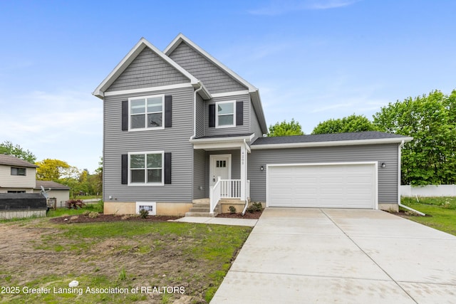 4205 Glenburne Blvd, Lansing, MI 48911 - view of front facade with a garage, concrete driveway, and fence