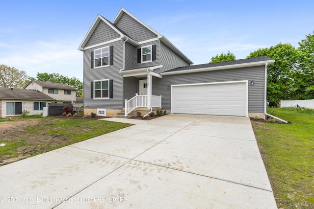 4205 Glenburne Blvd, Lansing, MI 48911 - traditional home with an attached garage and driveway