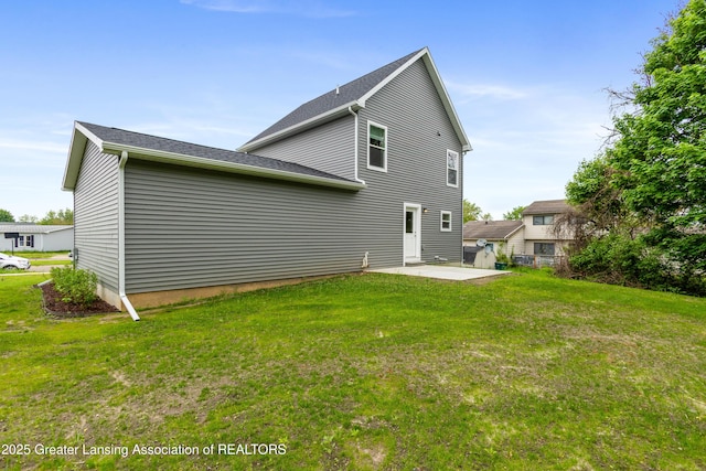 4205 Glenburne Blvd, Lansing, MI 48911 - rear view of property with a patio area and a yard