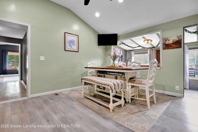 513 E Grand River Rd, Laingsburg, MI 48848 - dining space with wood finished floors, baseboards, vaulted ceiling, recessed lighting, and ceiling fan