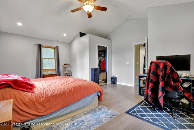 513 E Grand River Rd, Laingsburg, MI 48848 - bedroom featuring wood finished floors, baseboards, recessed lighting, ceiling fan, and high vaulted ceiling