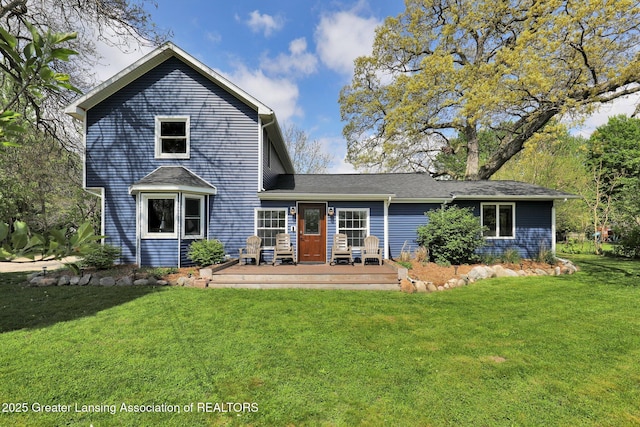 513 E Grand River Rd, Laingsburg, MI 48848 - back of house with a deck and a yard