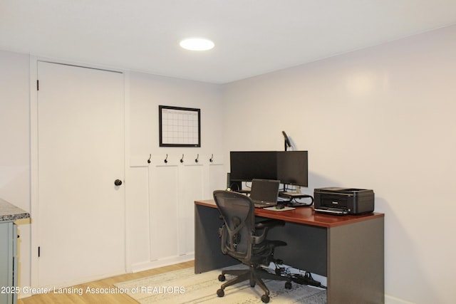 14275 Webster Rd, Bath, MI 48808 - office featuring light wood-style flooring and baseboards
