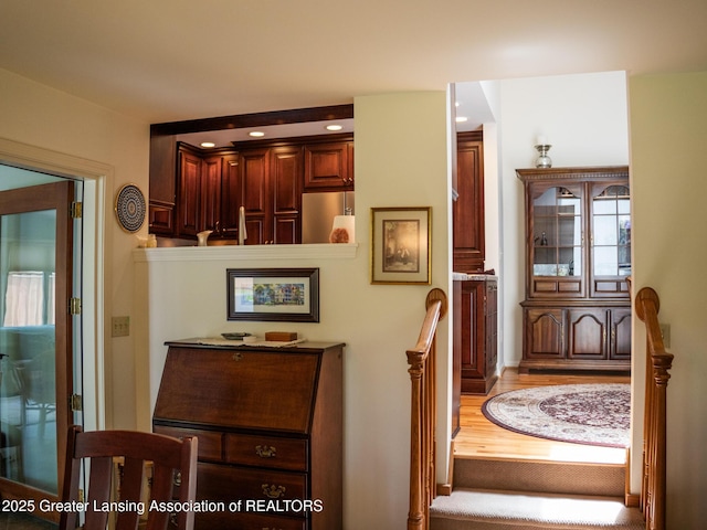 1561 Roseland Ave, East Lansing, MI 48823 - hall with wood finished floors and recessed lighting