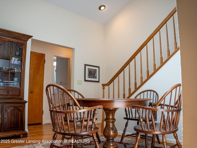 1561 Roseland Ave, East Lansing, MI 48823 - living area with wood finished floors, stairs, and recessed lighting