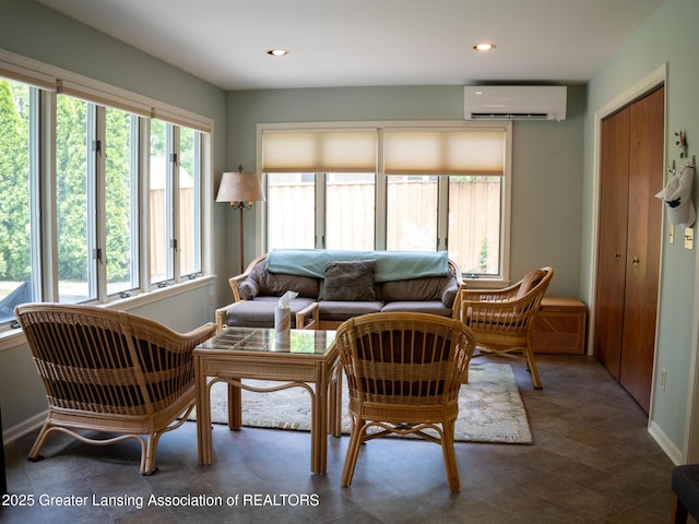 1561 Roseland Ave, East Lansing, MI 48823 - living room featuring a wall mounted AC, baseboards, and recessed lighting
