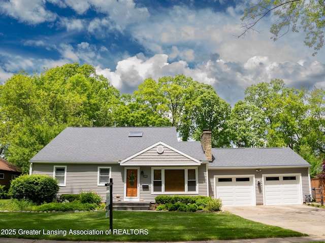 1561 Roseland Ave, East Lansing, MI 48823 - view of front of property with a garage, driveway, a chimney, a front yard, and roof with shingles