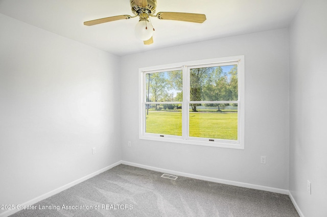7319 E 5th Point Highway, Eaton Rapids, MI 48827 - carpeted empty room with baseboards and ceiling fan
