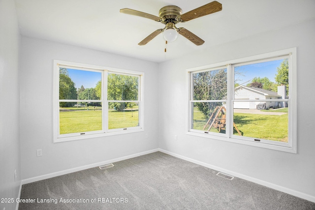 7319 E 5th Point Highway, Eaton Rapids, MI 48827 - carpeted empty room featuring baseboards and ceiling fan