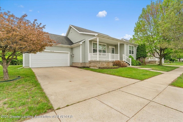 3816 Kiskadee Dr, East Lansing, MI 48823 - view of front facade featuring covered porch, a front yard, a garage, and driveway