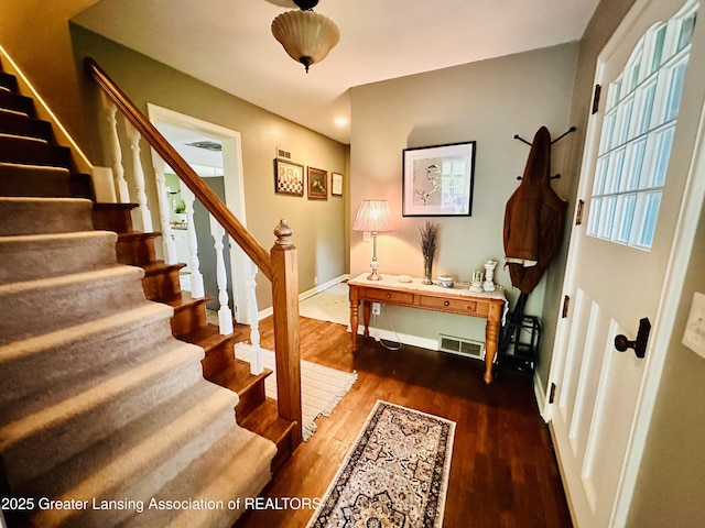 812 Dryer Farm Rd, Lansing, MI 48917 - stairway with wood finished floors and baseboards