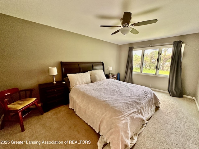 812 Dryer Farm Rd, Lansing, MI 48917 - bedroom featuring light carpet, baseboards, and a ceiling fan