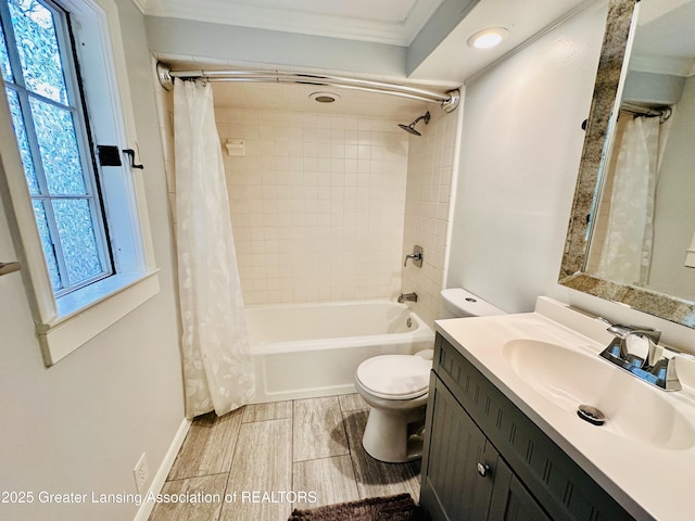 812 Dryer Farm Rd, Lansing, MI 48917 - full bath with plenty of natural light, toilet, vanity, shower / tub combo with curtain, and crown molding