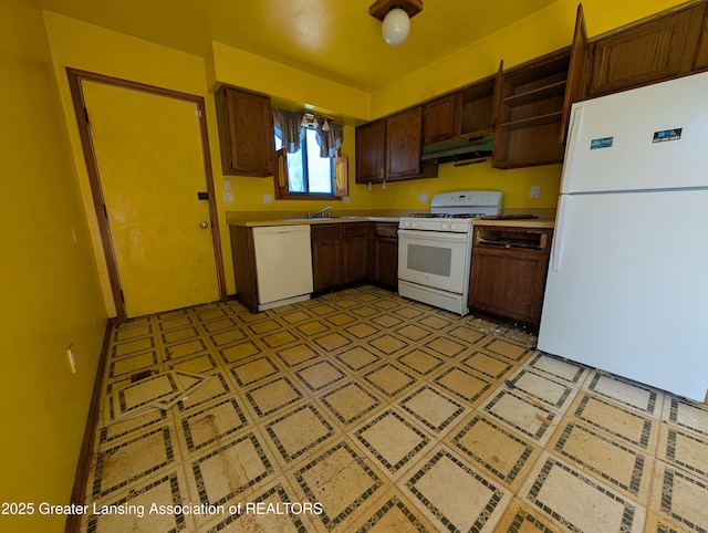 5650 Hughes Rd, Lansing, MI 48911 - kitchen featuring white appliances, under cabinet range hood, light countertops, open shelves, and light floors