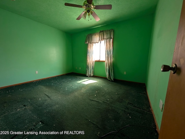 5650 Hughes Rd, Lansing, MI 48911 - unfurnished room with a textured ceiling, baseboards, carpet flooring, and a ceiling fan