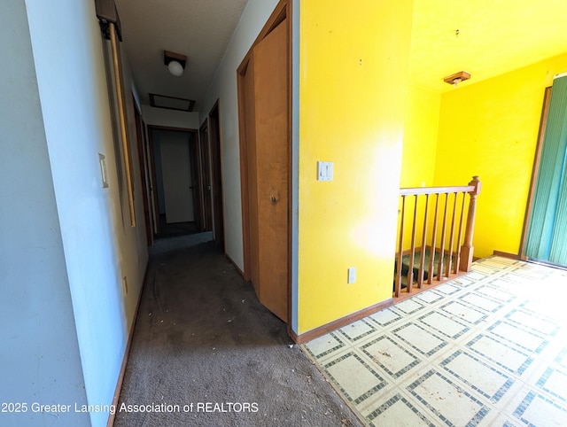 5650 Hughes Rd, Lansing, MI 48911 - corridor featuring baseboards