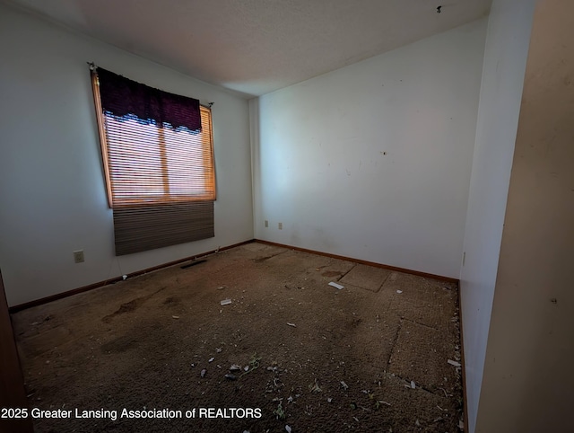 5650 Hughes Rd, Lansing, MI 48911 - empty room featuring baseboards