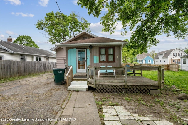 912 Pacific Ave, Lansing, MI 48910 - view of front of property with fence and a wooden deck