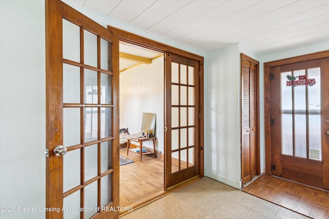 912 Pacific Ave, Lansing, MI 48910 - foyer entrance featuring french doors and tile patterned floors