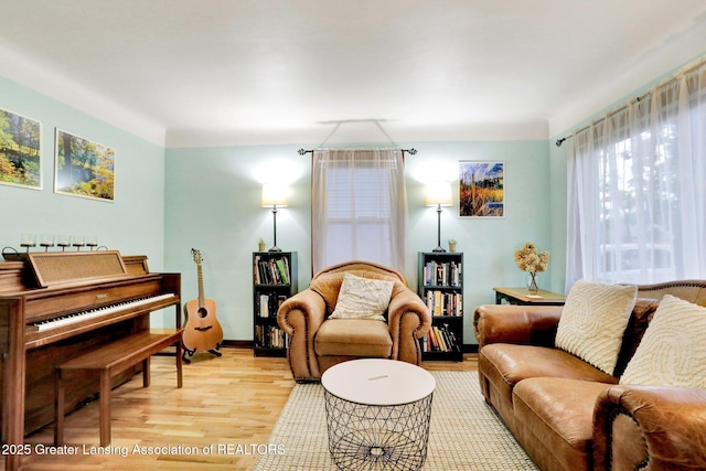 1411 Poxson Ave, Lansing, MI 48910 - living room featuring light wood-type flooring and baseboards