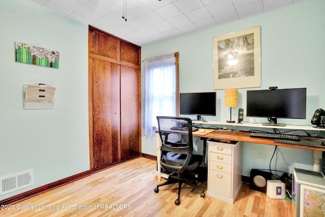 1411 Poxson Ave, Lansing, MI 48910 - office space featuring light wood finished floors and baseboards