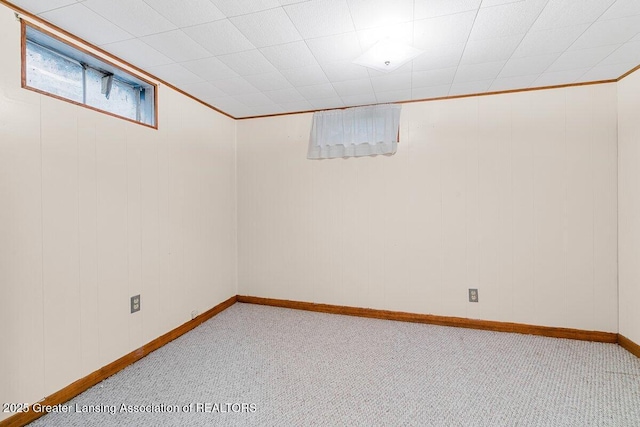 15988 Comdon Rd, Albion, MI 49224 - below grade area featuring carpet floors, baseboards, and crown molding
