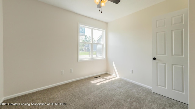 4918 Westhaven Blvd, Lansing, MI 48917 - spare room with ceiling fan, carpet flooring, and baseboards