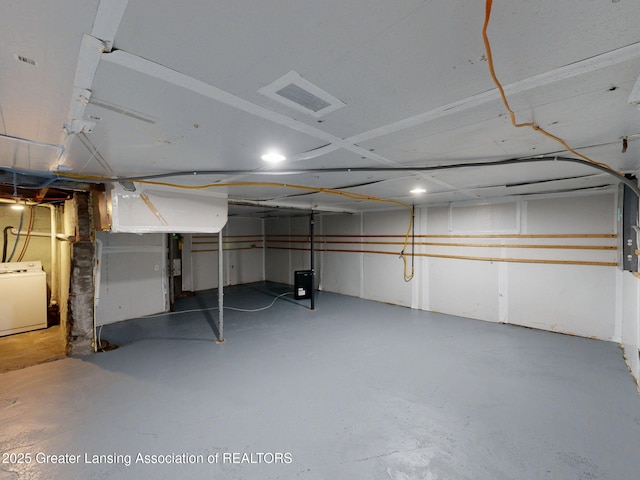 1023 Bement St, Lansing, MI 48912 - unfinished below grade area with washer / clothes dryer