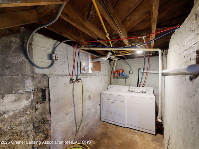 1023 Bement St, Lansing, MI 48912 - unfinished basement featuring washer and clothes dryer