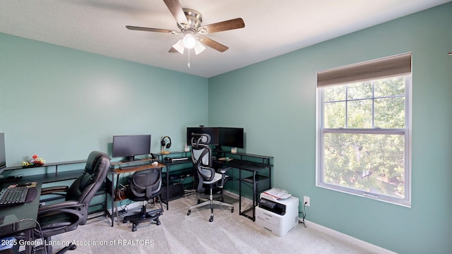 1055 Oakwood Dr, Dewitt, MI 48820 - carpeted home office with ceiling fan and baseboards