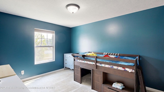 1055 Oakwood Dr, Dewitt, MI 48820 - bedroom with carpet and baseboards
