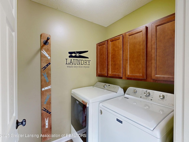 1055 Oakwood Dr, Dewitt, MI 48820 - washroom featuring cabinet space, washing machine and clothes dryer, and a textured ceiling
