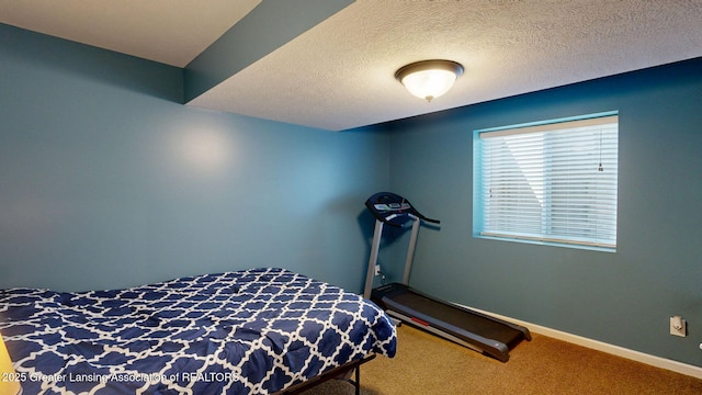 1055 Oakwood Dr, Dewitt, MI 48820 - carpeted bedroom with baseboards and a textured ceiling