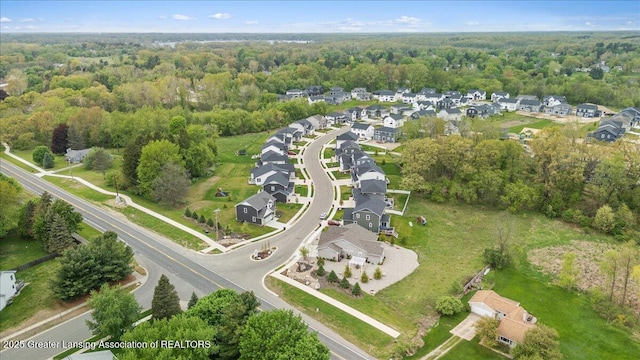 5651 Copper Creek Dr, Haslett, MI 48840 - aerial overview of property's location featuring a heavily wooded area and nearby suburban area